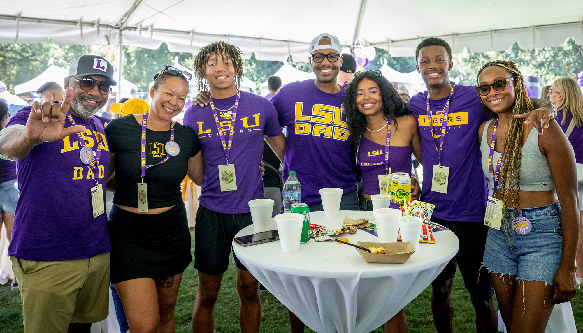 Students and their dads pose for a group photo during Family Weekend 2024 at LSU. Placeholder Image