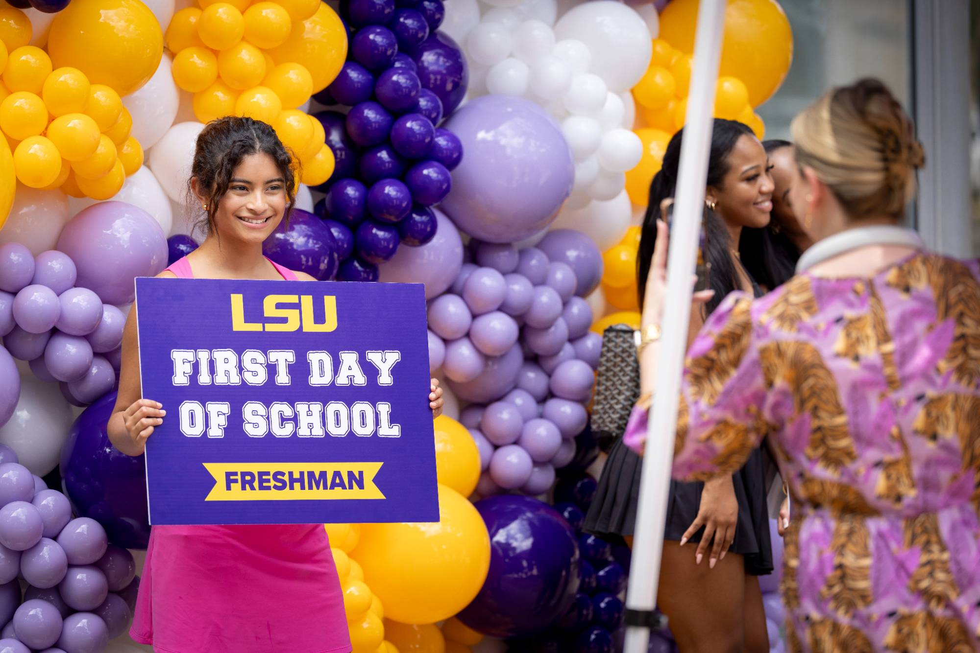 LSU student holds a first day of semester sign LSU student on the first day of Fall 2024