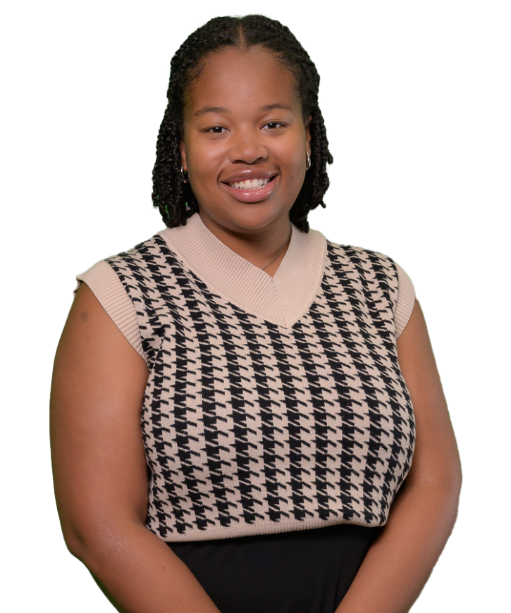 OOE recipient Emily Demps, a young woman with a houndstooth shirt