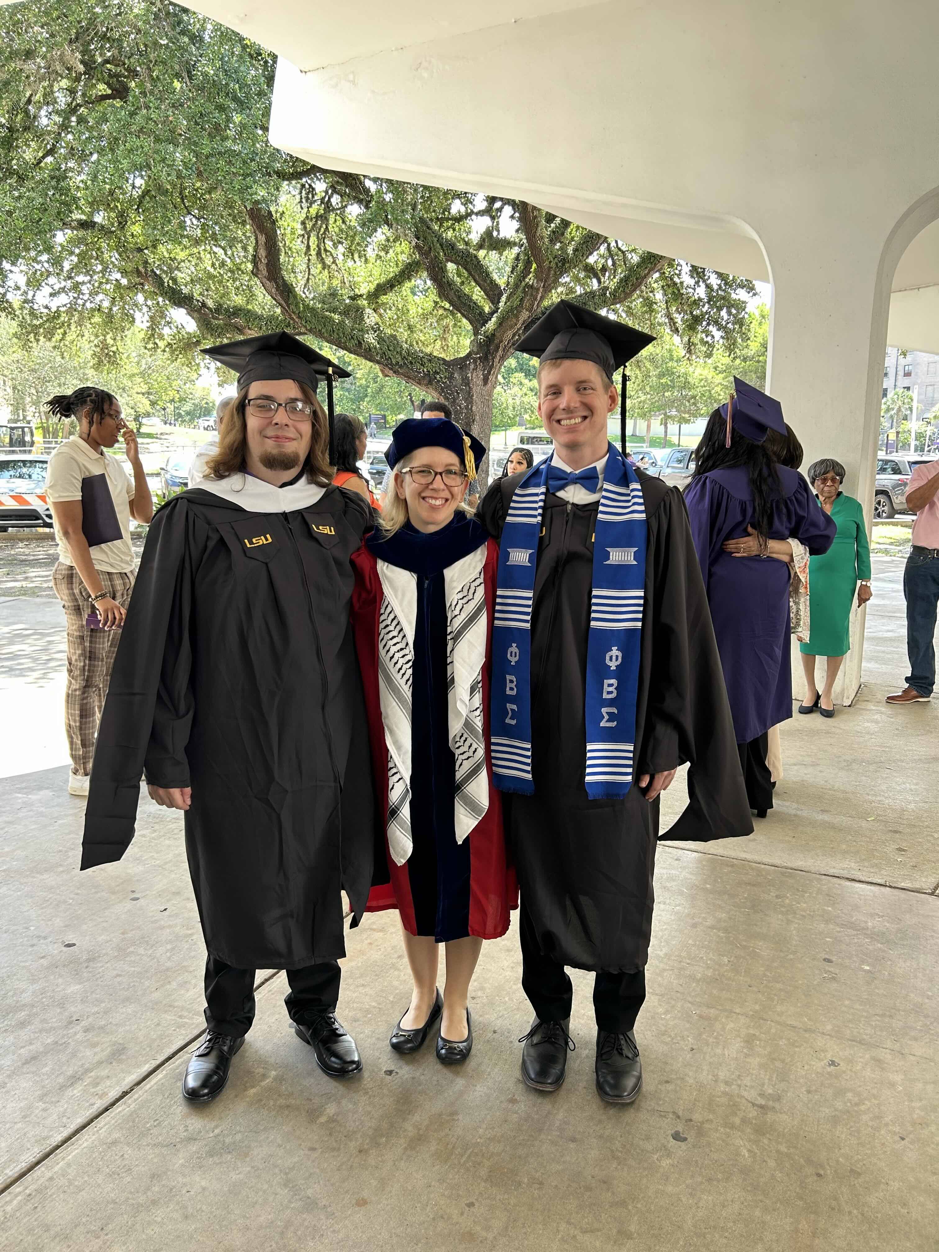 graduating MA students faculty and graduating MA students