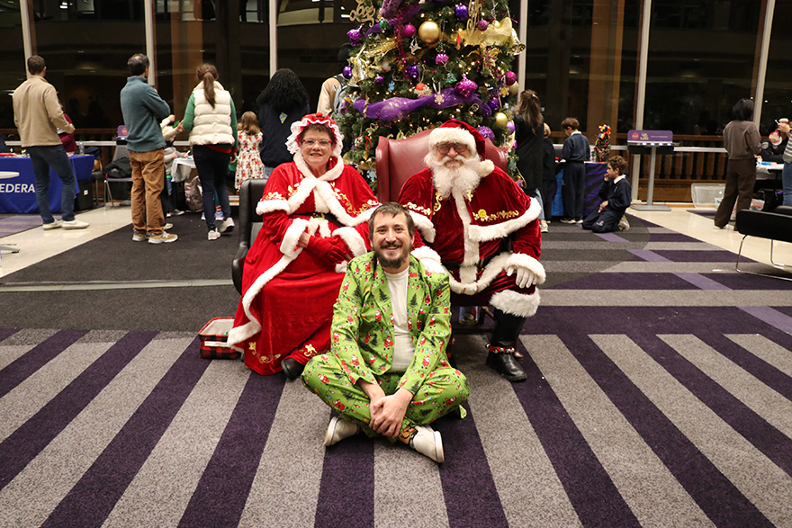 staff with Santa and Mrs. Claus